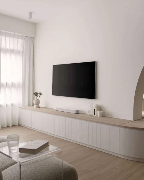 scandinavian house living room with natural light, clean lines and wood accents