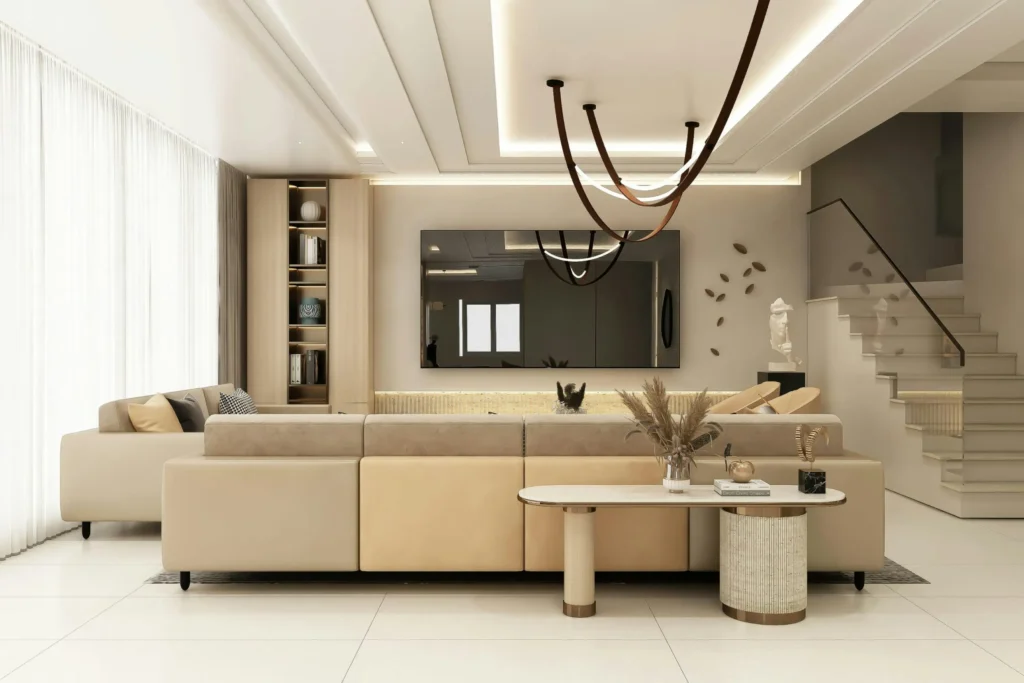 Modern living room with recessed cove lights and sculptural pendants, demonstrating scene-based smart mood lighting