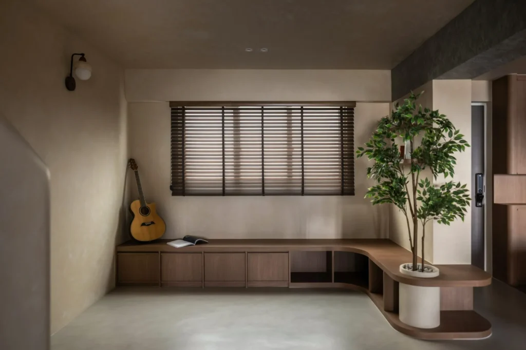 Neutral-toned interior with built-in storage and warm ambient lighting.